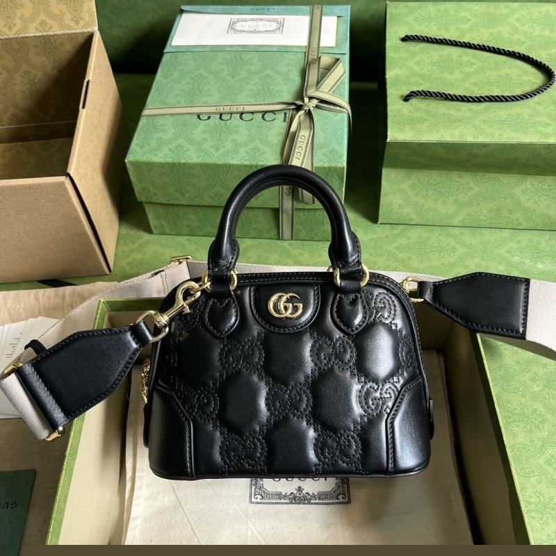 G*u*i top handle bags